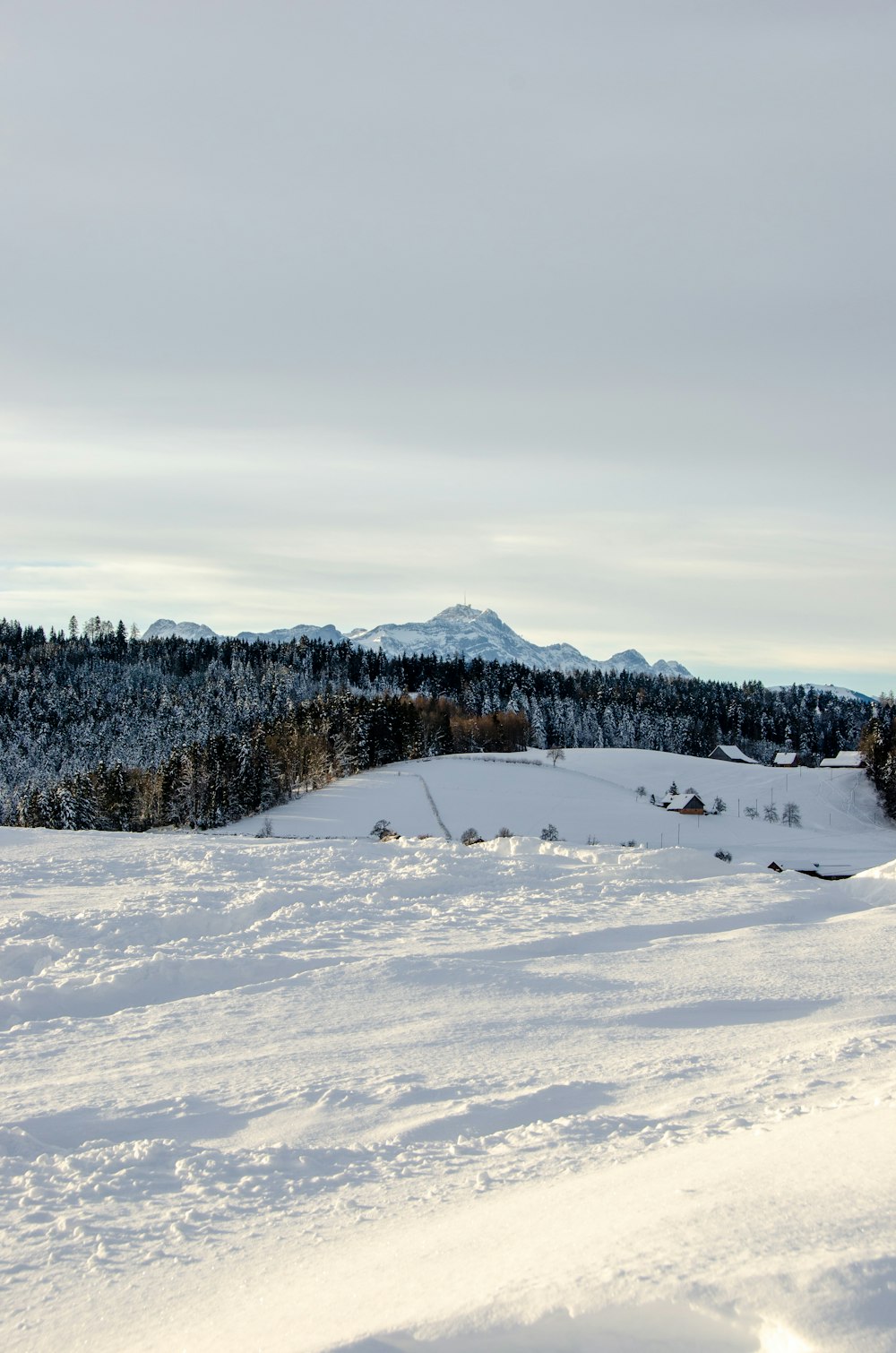 snow covered mountain during daytime