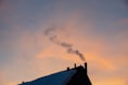 black roof under white clouds