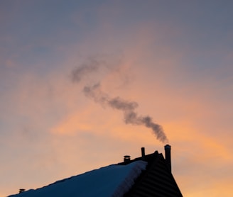 black roof under white clouds