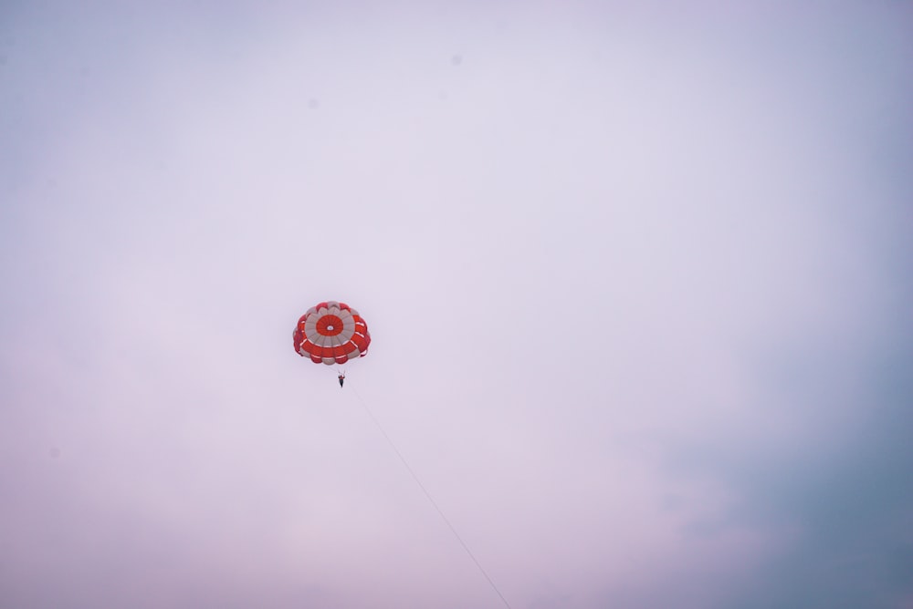 red balloon floating on the sky