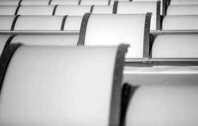 white paper roll in black plastic holder