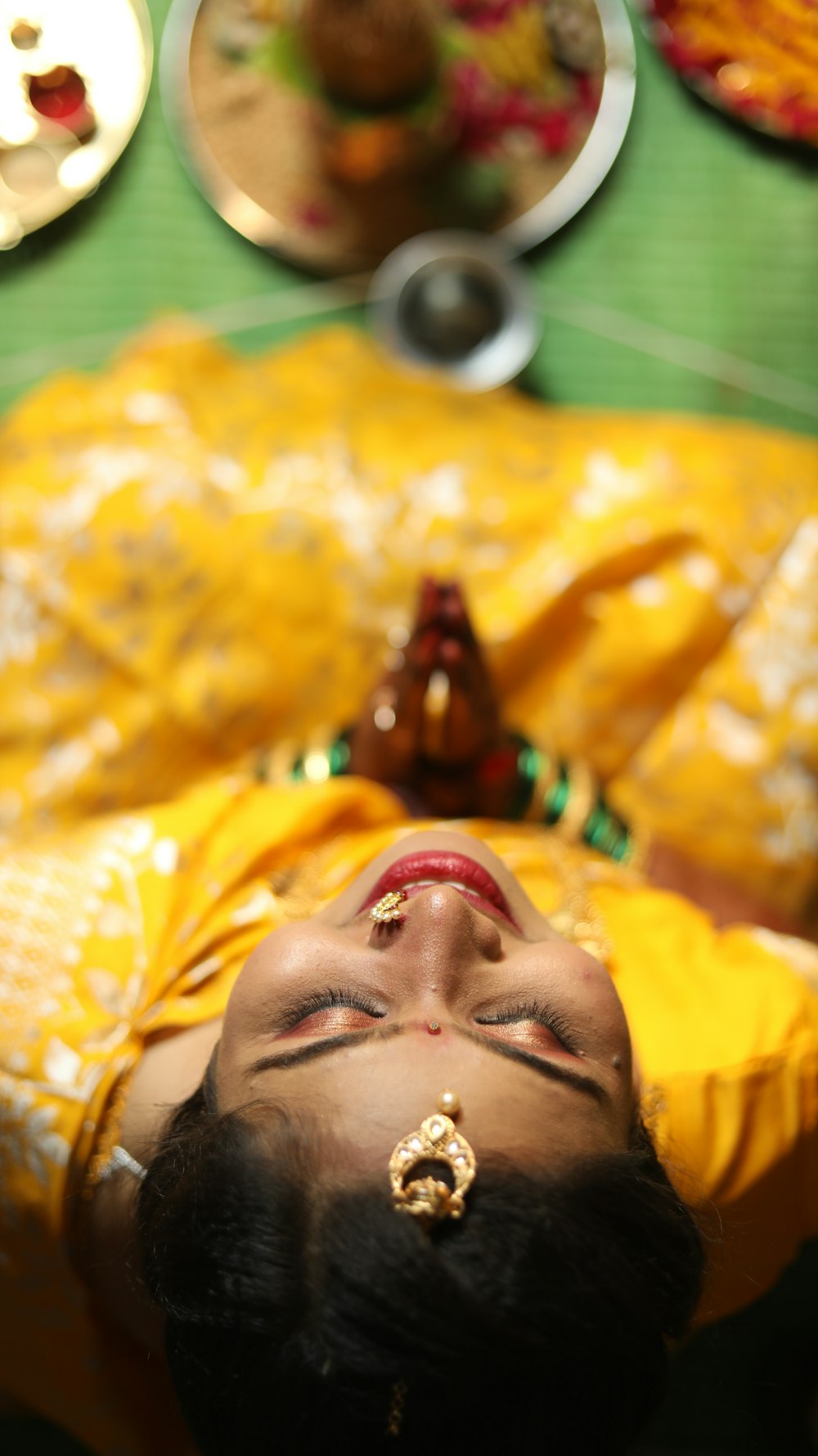 man in yellow shirt with red tongue out