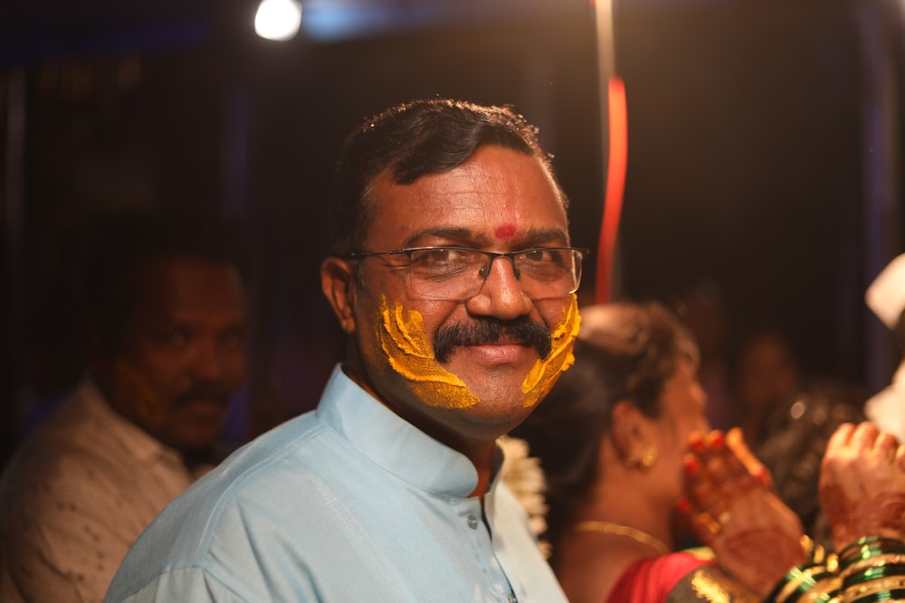 man in white dress shirt wearing eyeglasses