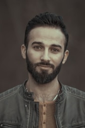man in blue denim jacket