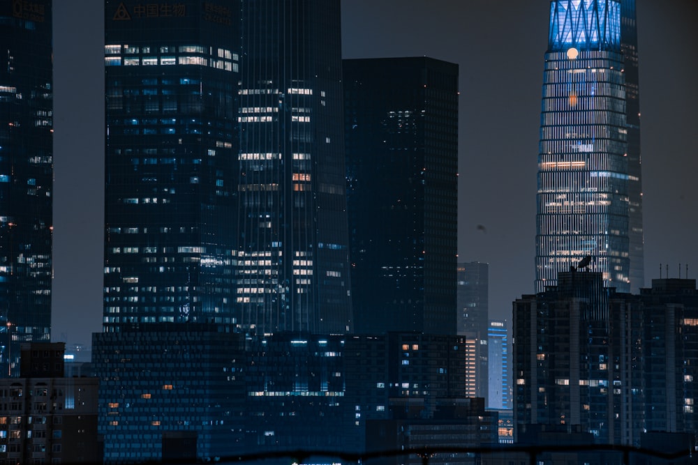 black and white city buildings during night time