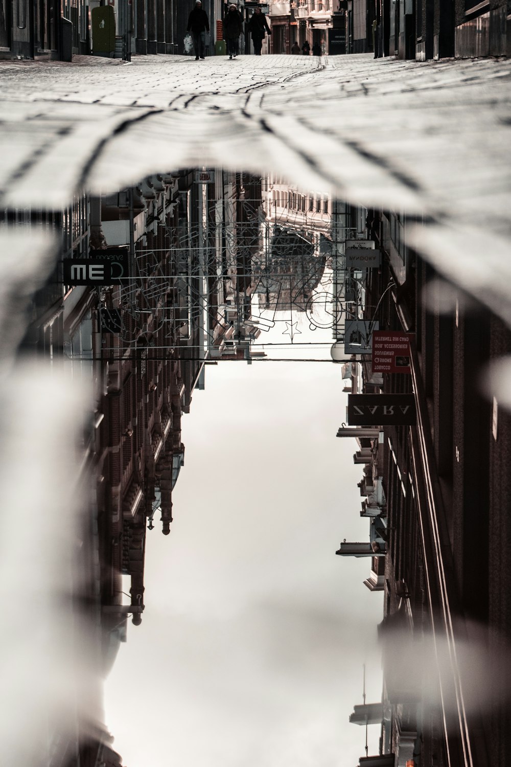 red metal bridge over water