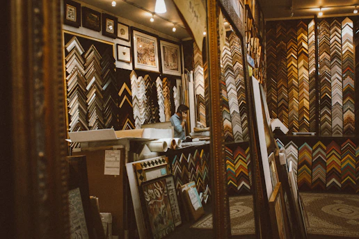 woman in white shirt sitting on chair
