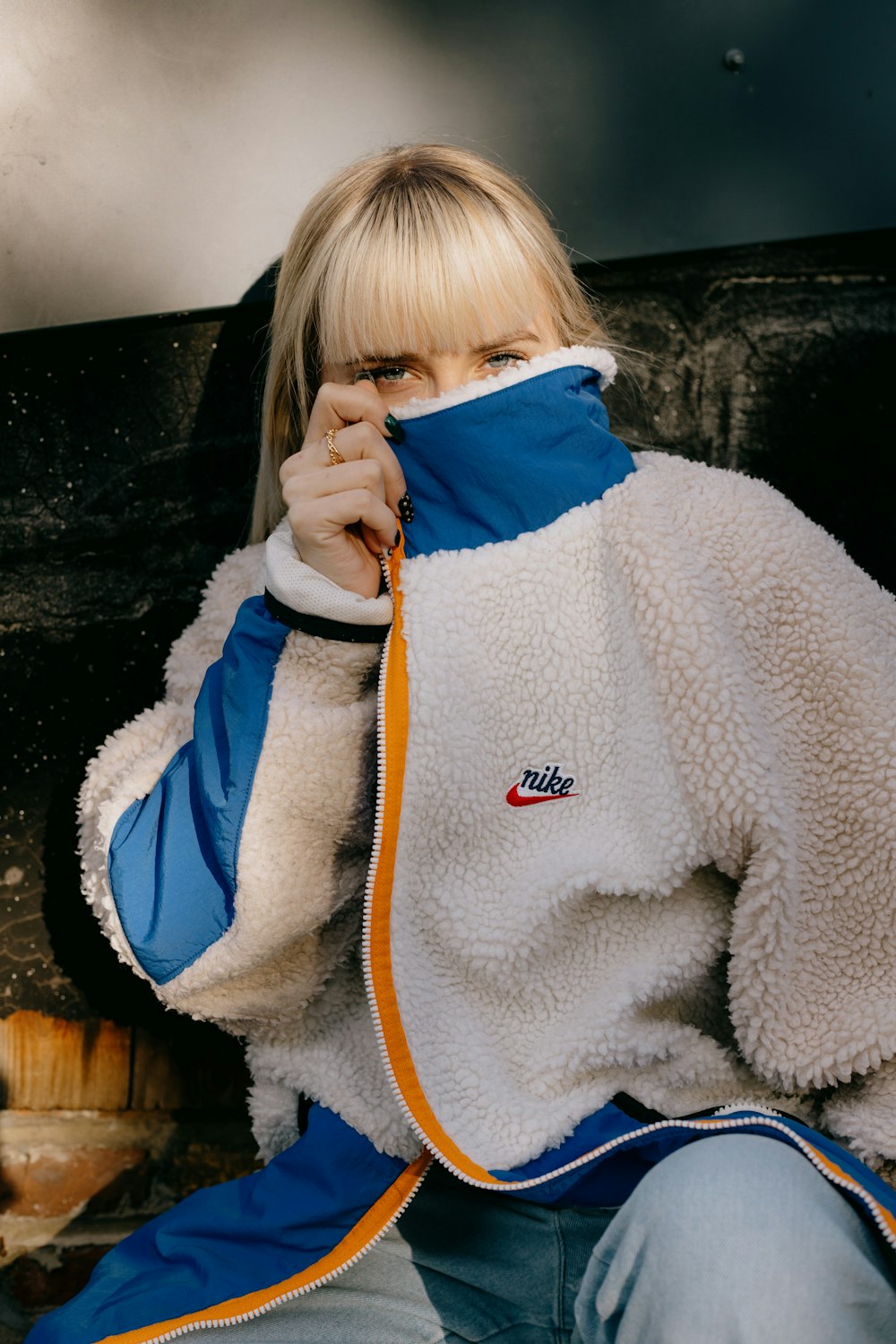 girl in blue and white jacket