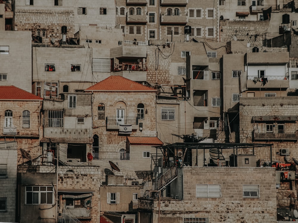 brown and white concrete buildings during daytime