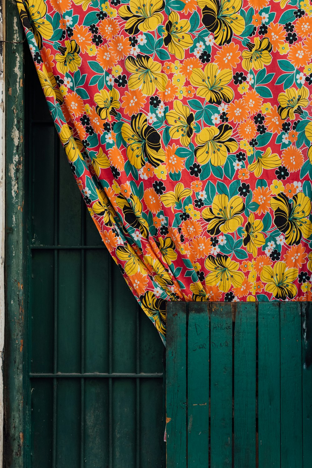 yellow red and blue floral textile