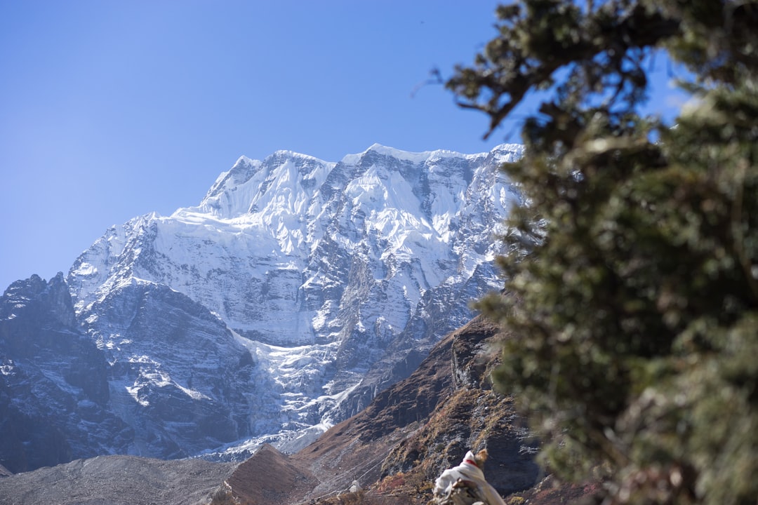 snow covered mountain during daytime