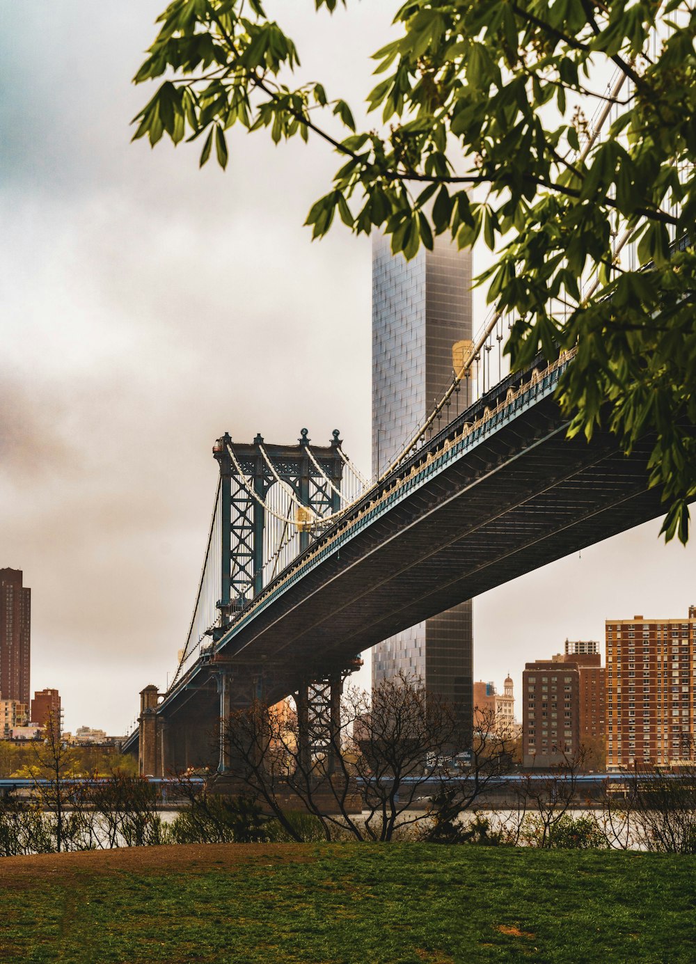 gray bridge under gray sky