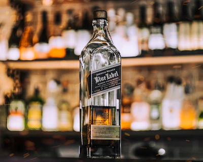 a bottle of liquor sitting on top of a counter