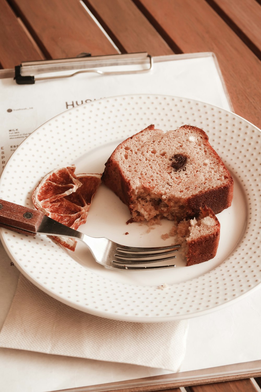 sliced chocolate cake on white ceramic plate