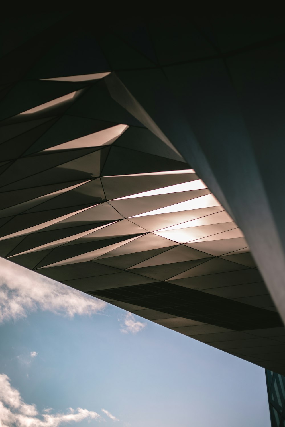 white and black concrete building under blue sky during daytime