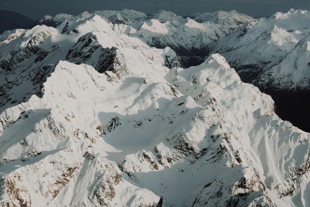 snow covered mountain during daytime