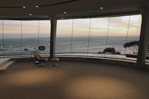 Bright and airy guest room featuring modern decor and ocean views.