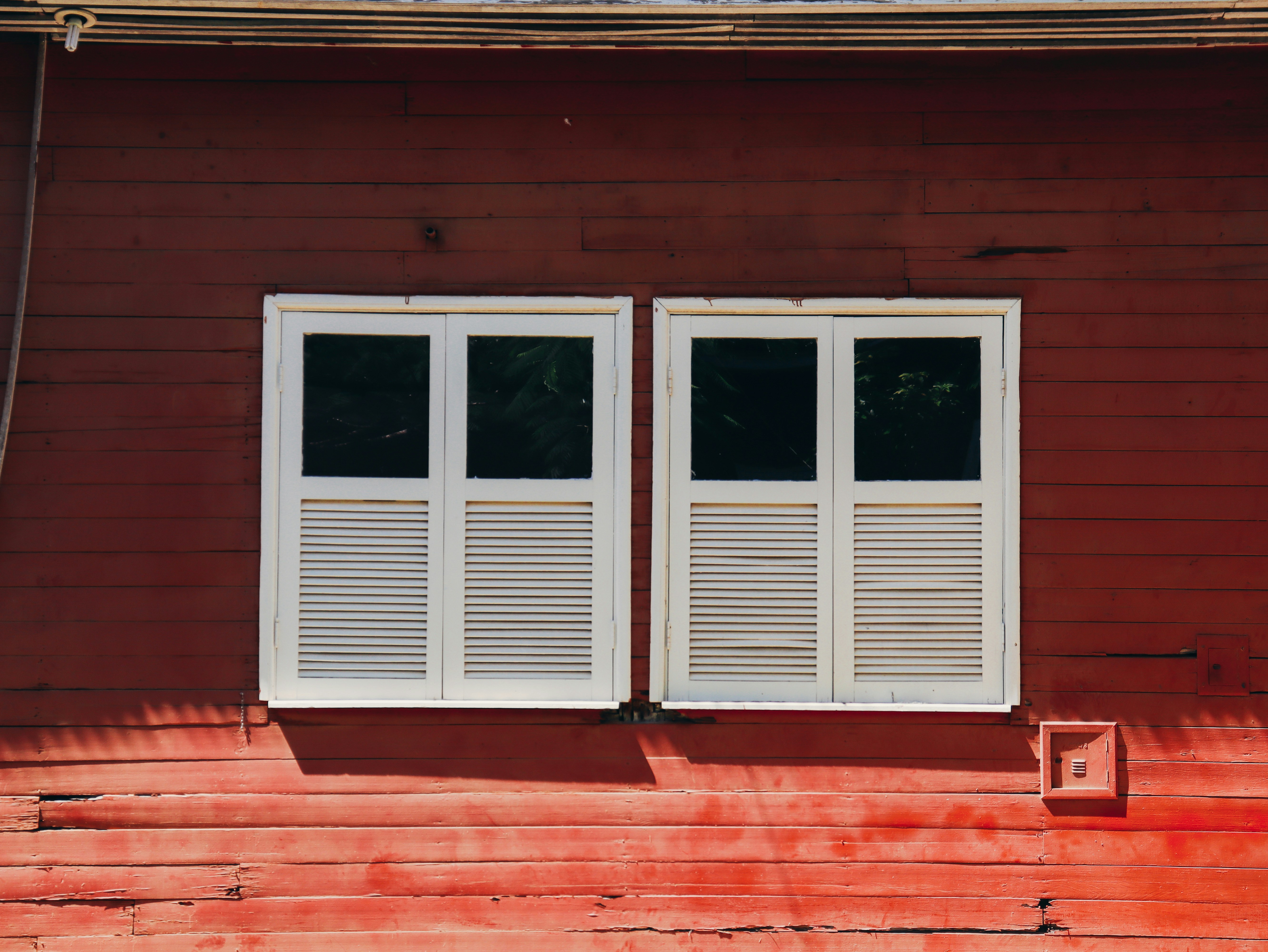 white wooden framed glass window