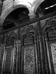 Intricate Mughal architectural details carved in sandstone and marble.