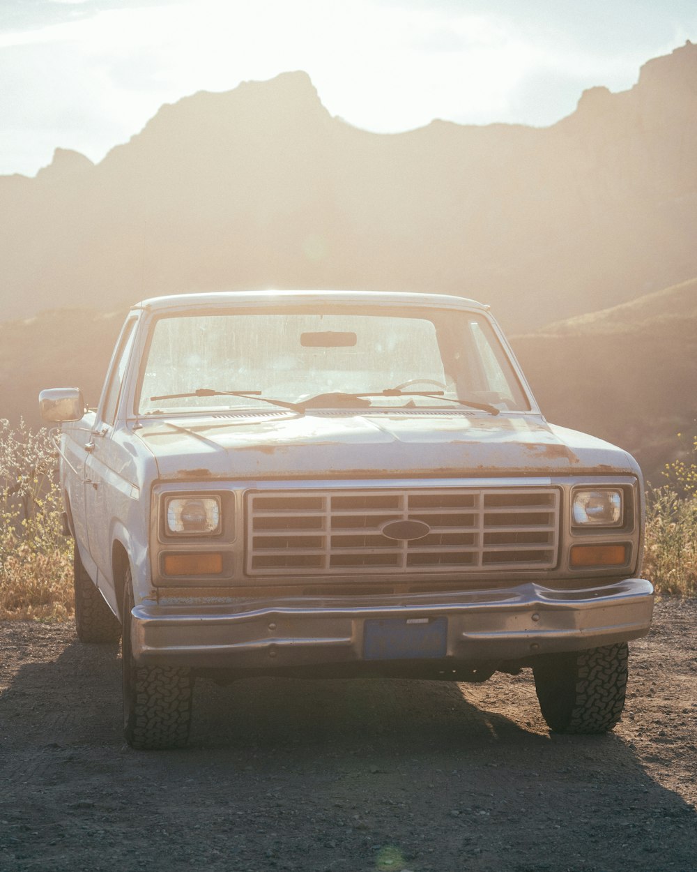 brown chevrolet car on brown soil