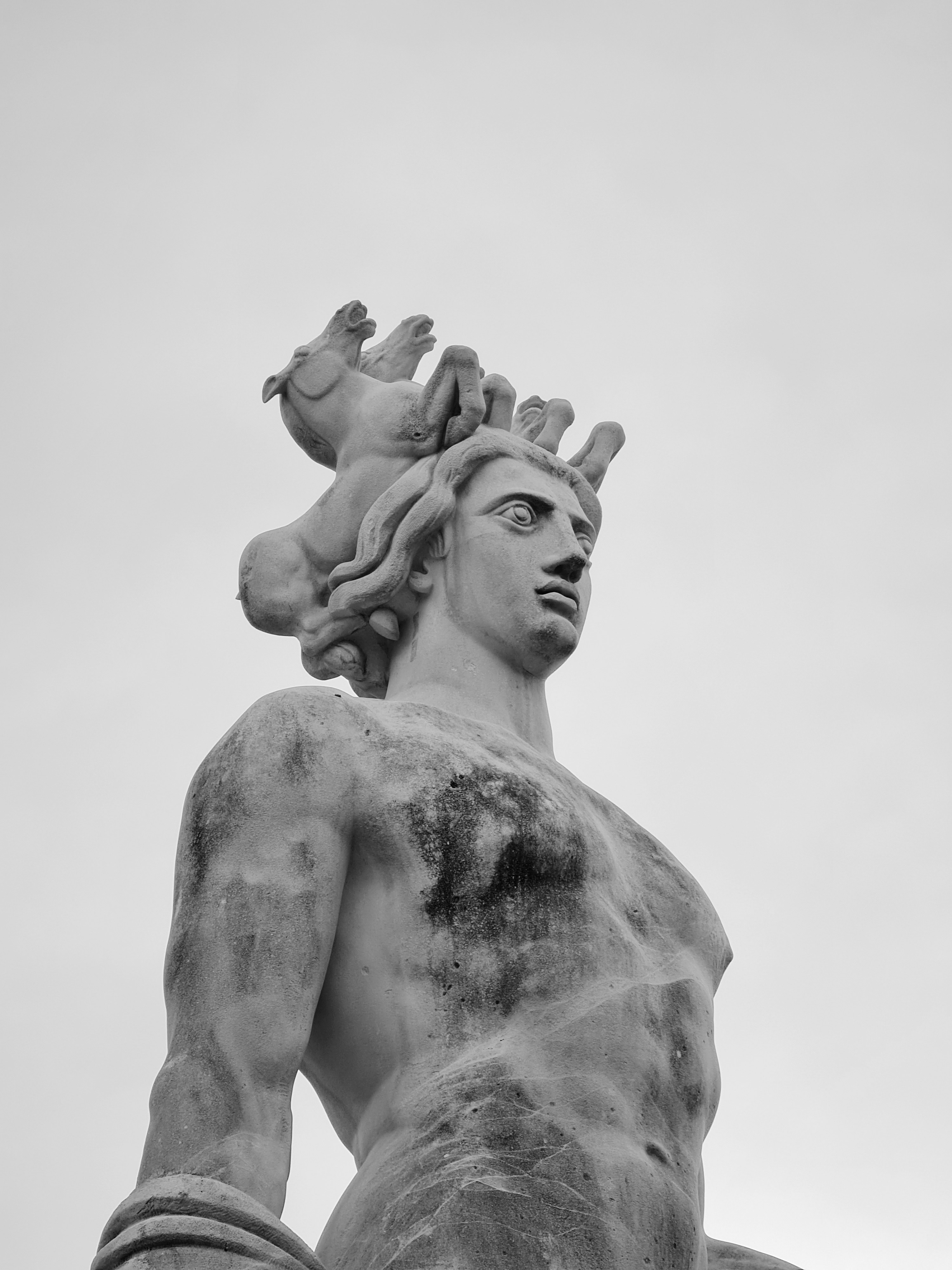 Gray concrete statue of man photo Free Grey Image on Unsplash