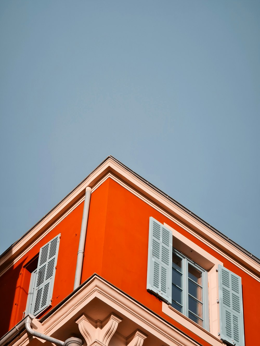 brown concrete building under blue sky during daytime