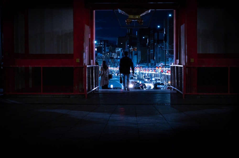 people in a restaurant with lights turned on during night time