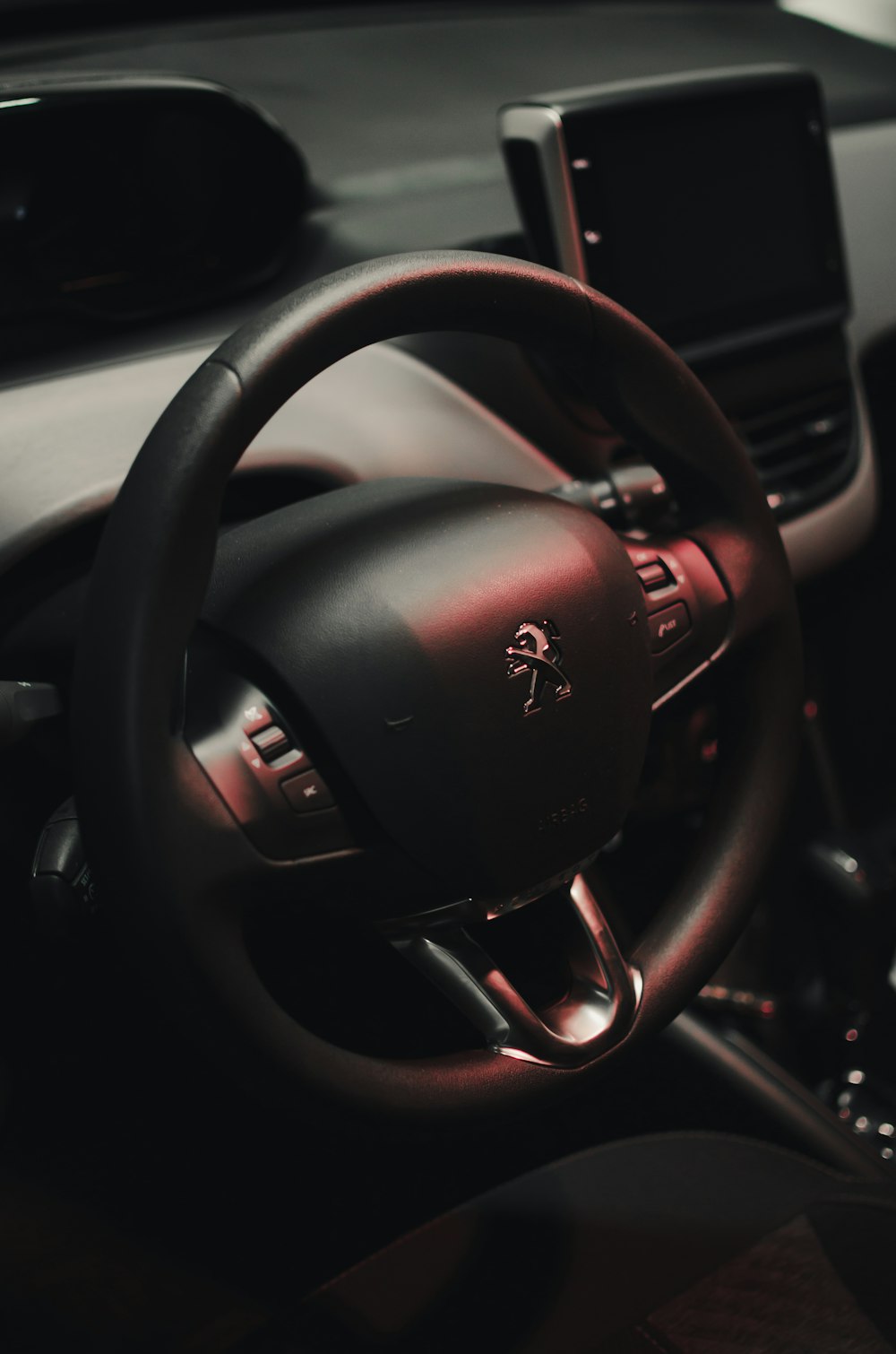 black and silver steering wheel