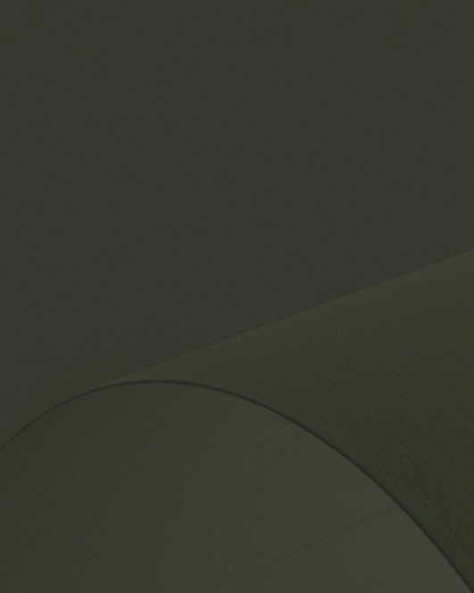 Soft textured white background with subtle navy and gold gradient overlay creating an elegant, minimal hero backdrop.