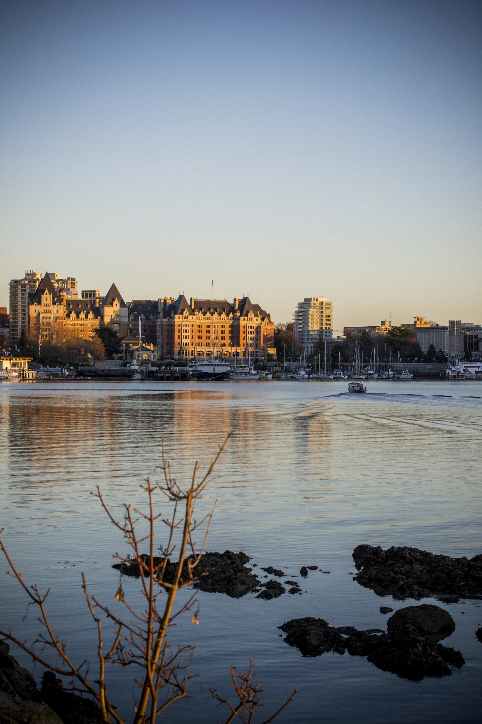 Victoria BC Inner Harbour with Parliament buildings at dusk