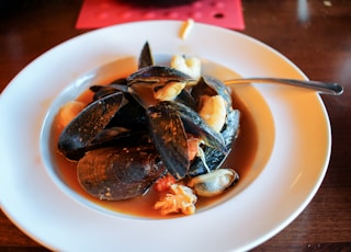 cooked fish on white ceramic plate