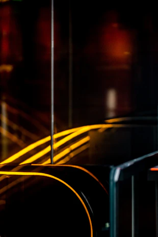 Dark, mysterious abstract neon-lit shapes evoking curiosity and intrigue.
