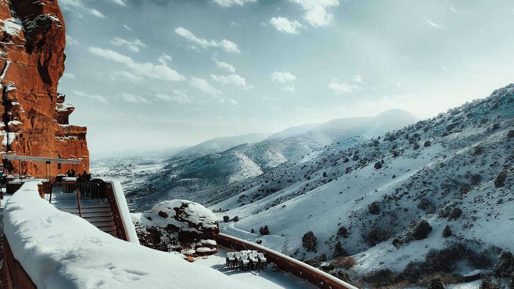  snow covered mountains under blue sky during daytime