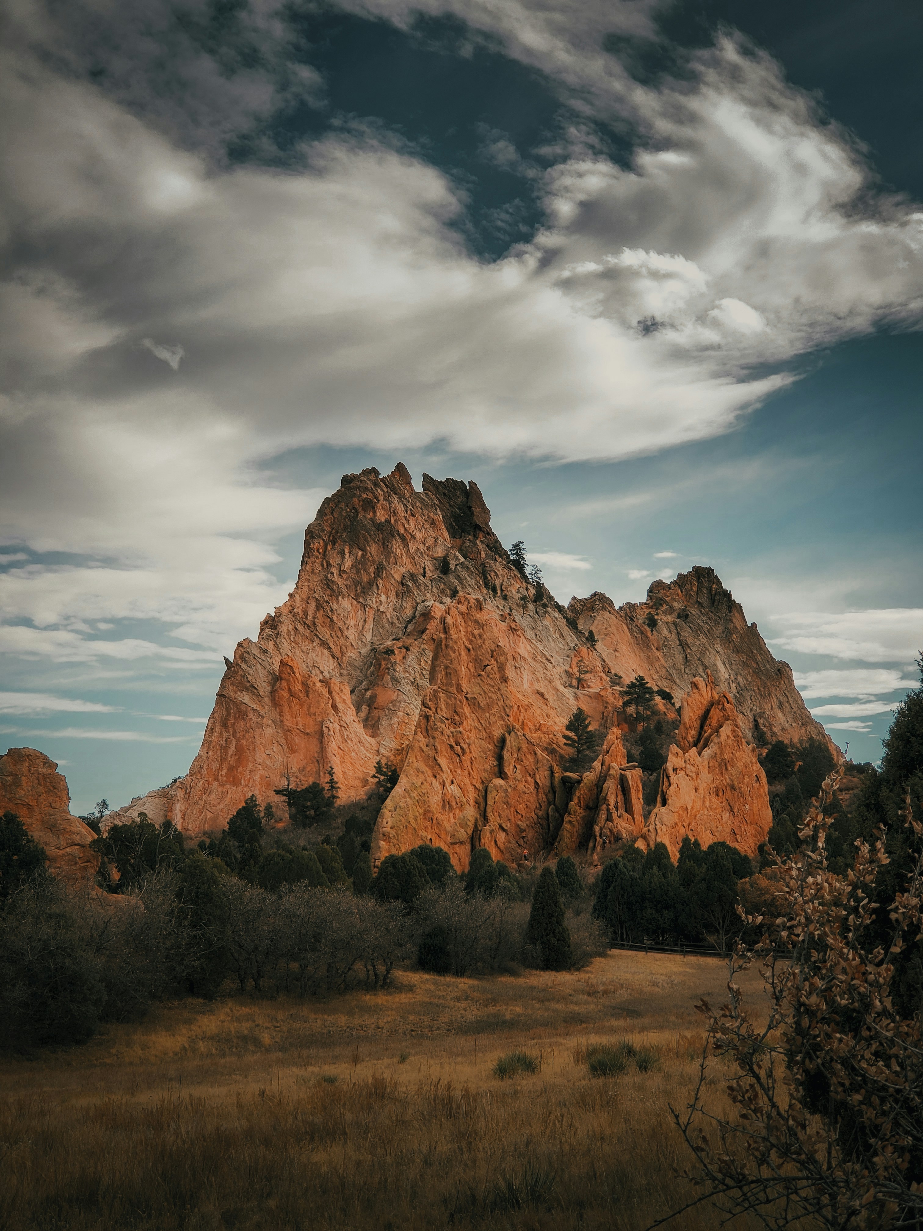 brown rocky mountain under blue sky