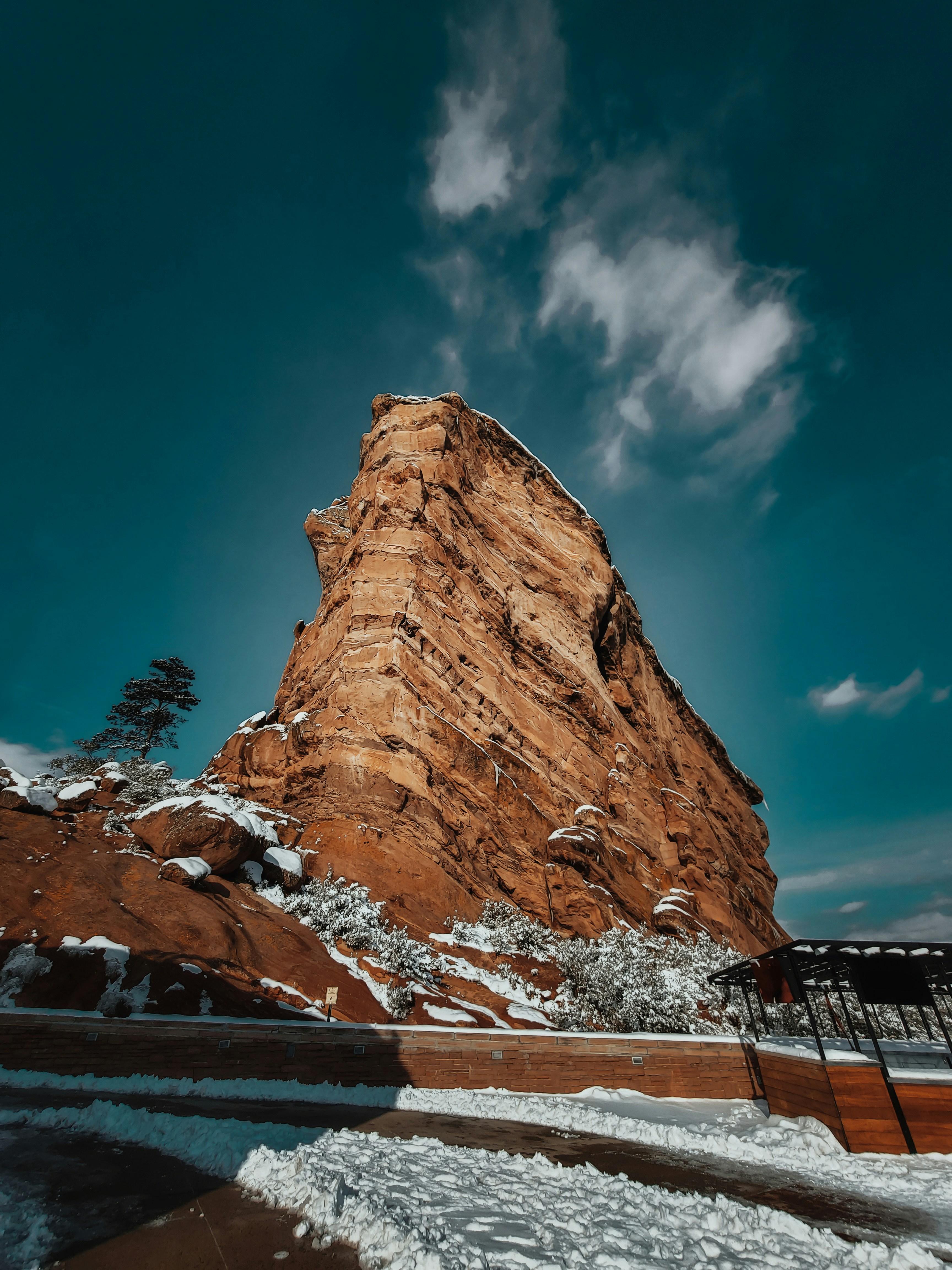 brown rock formation under blue sky during daytime