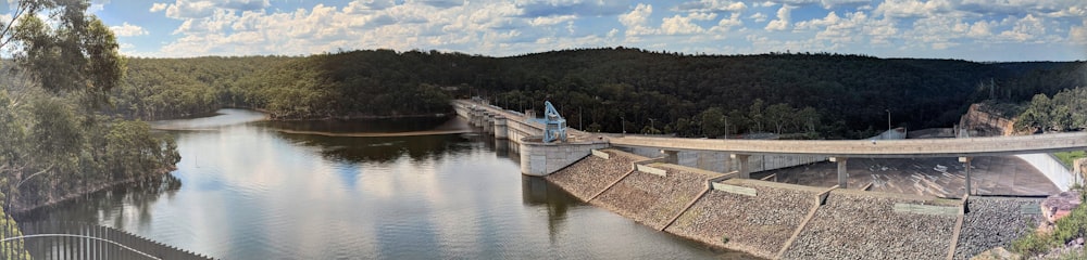 white and brown concrete building near body of water during daytime