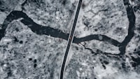 Car driving on a snow covered road