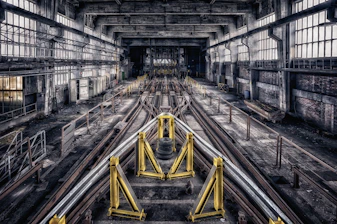 train rail in the middle of a tunnel