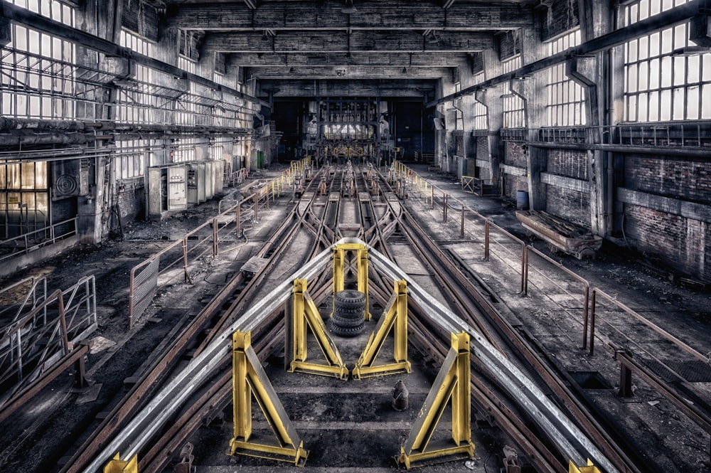 train rail in the middle of a tunnel