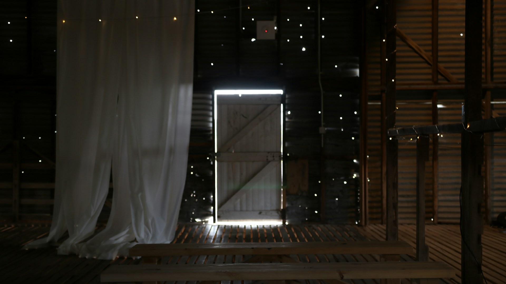 woman wearing yellow long-sleeved dress under white clouds and blue sky during daytime