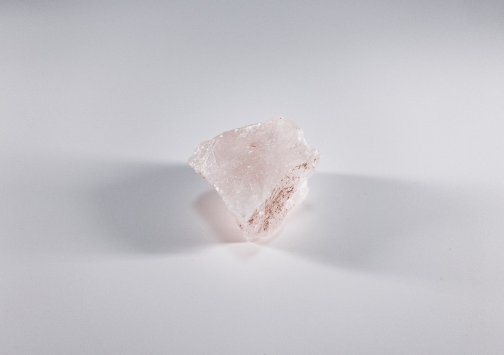 Some Pink Crystals Are On A Black Background, Pictures Of Rose Quartz  Background Image And Wallpaper for Free Download