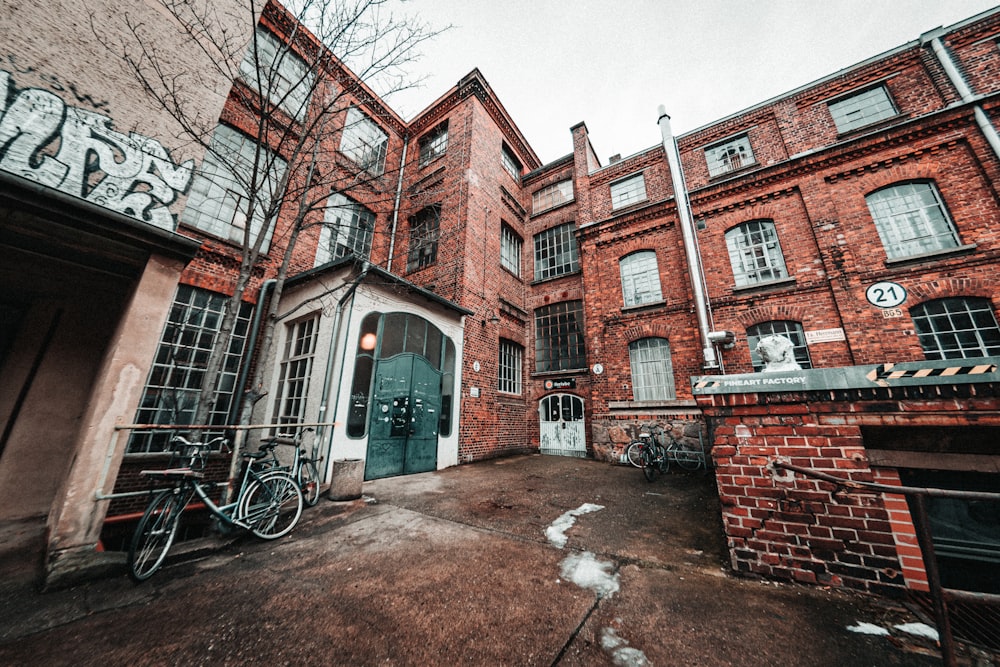 brown brick building with glass window