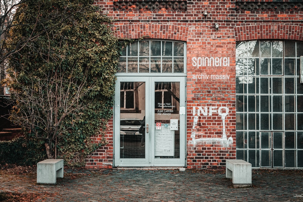 brown brick building with glass windows