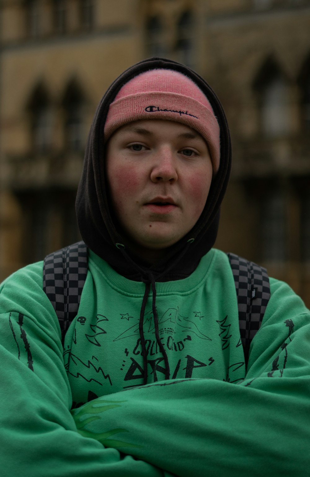 woman in green and black hoodie