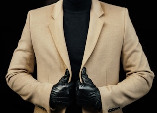 man in brown suit jacket