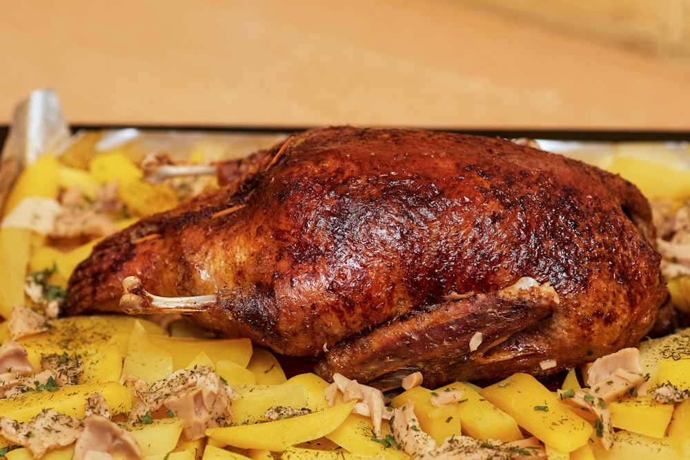 roasted chicken on white ceramic plate