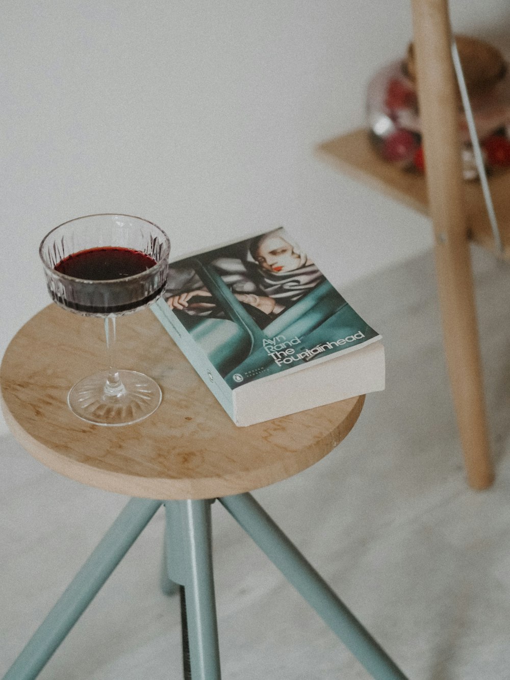 clear glass cup on brown wooden table