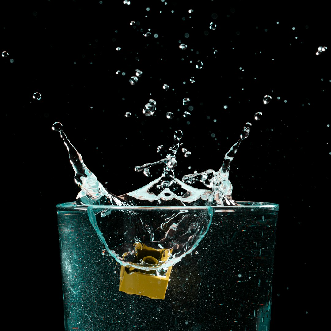 water splash on green container