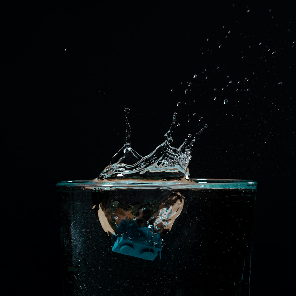 person in blue water in water