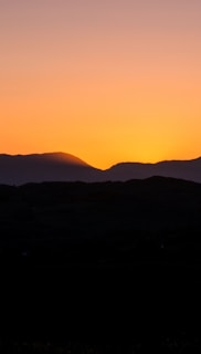 An Appalachian landscape at sunset, symbolizing hope and resilience.